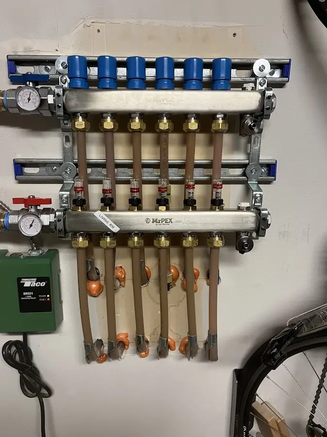 Plumber performing Water Heater Repair at a residential property in Cedar Lake